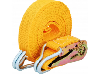 żółty zwinięty pas transportowy